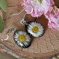 Black oval daisy earrings