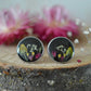 Black floral stud earrings