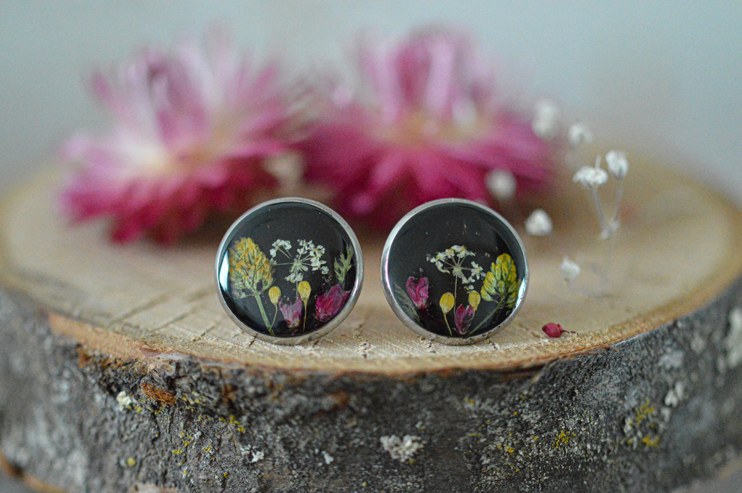 Black floral stud earrings