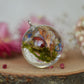 Necklace with real flowers and moss