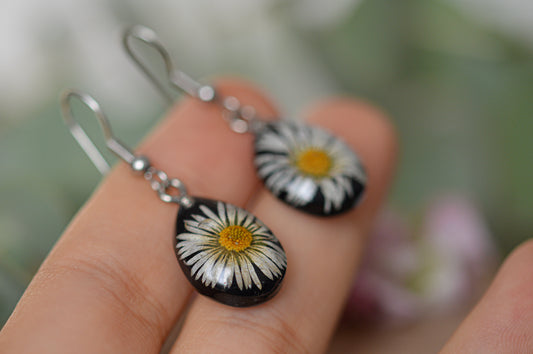 Black daisy earrings