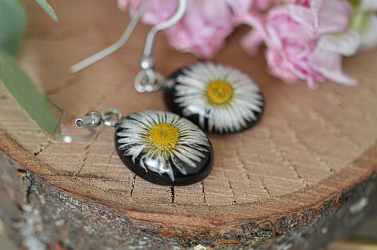 Black oval daisy earrings