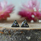 Black triangle floral stud earrings