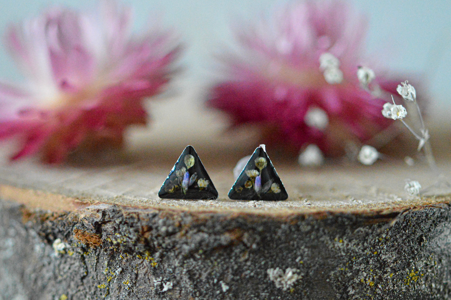 Black triangle floral stud earrings