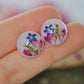 Floral pink stud earrings