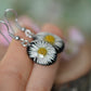 Black oval daisy earrings