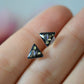 Black triangle floral stud earrings