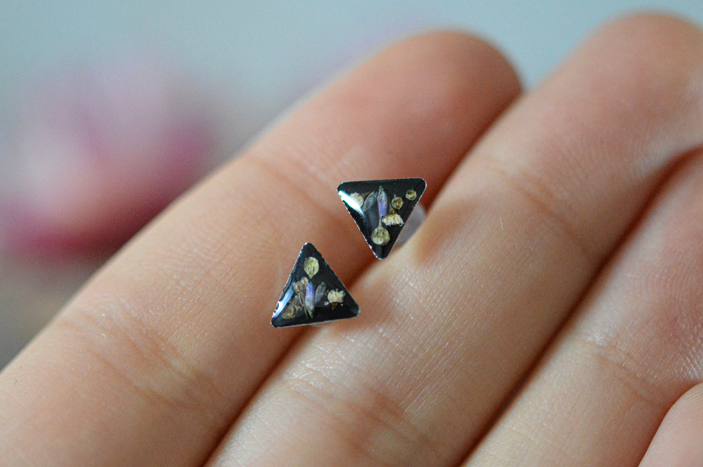 Black triangle floral stud earrings