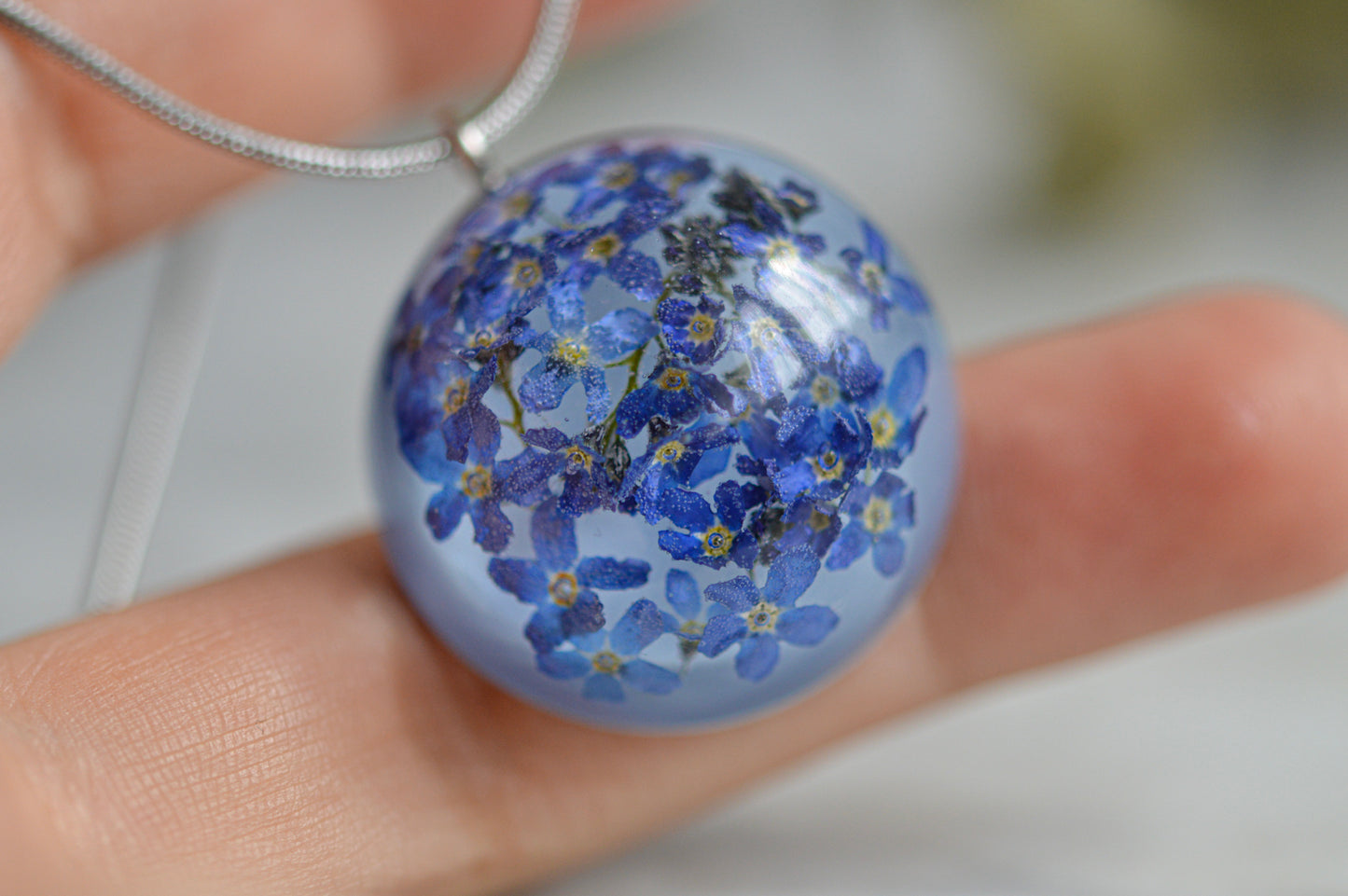 Blue necklace with forget-me-nots