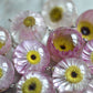 Paper daisy necklace